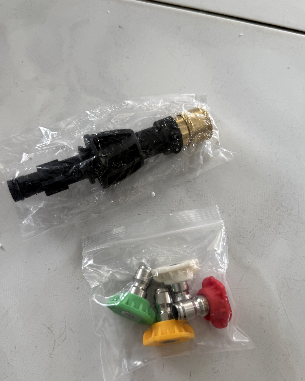 Nozzle and quick-change tips