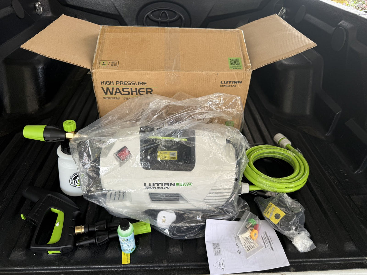 A P6 Pro and its accessory kit unboxed in the back of a Hilux in Bintulu