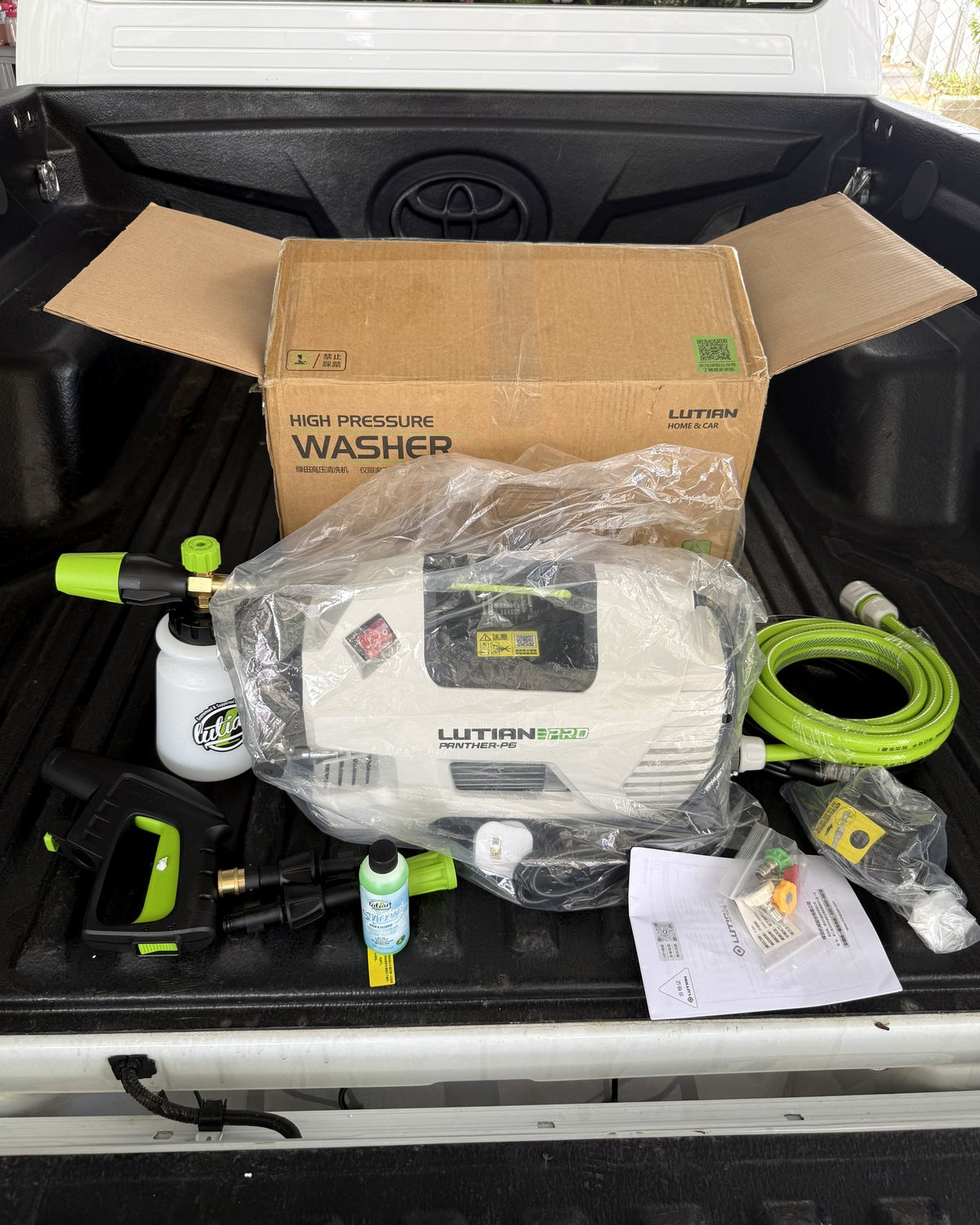 P6 Pro unboxed in a pickup truck bed with its full accessory kit